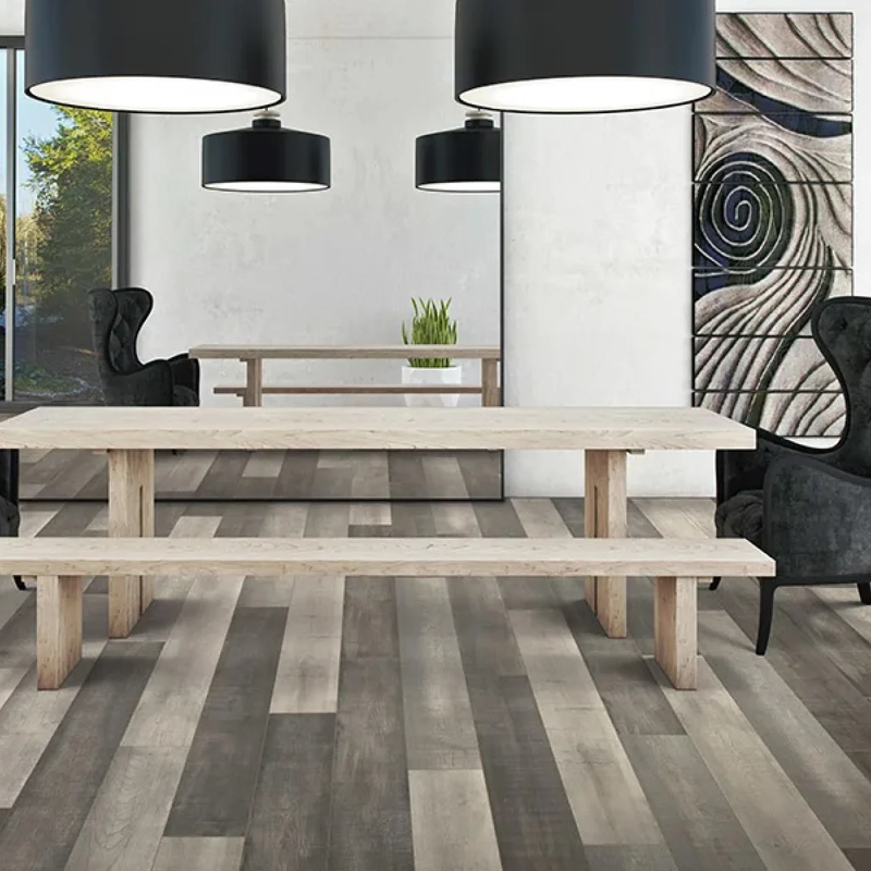 Two toned laminate floors installed in modern dinning room