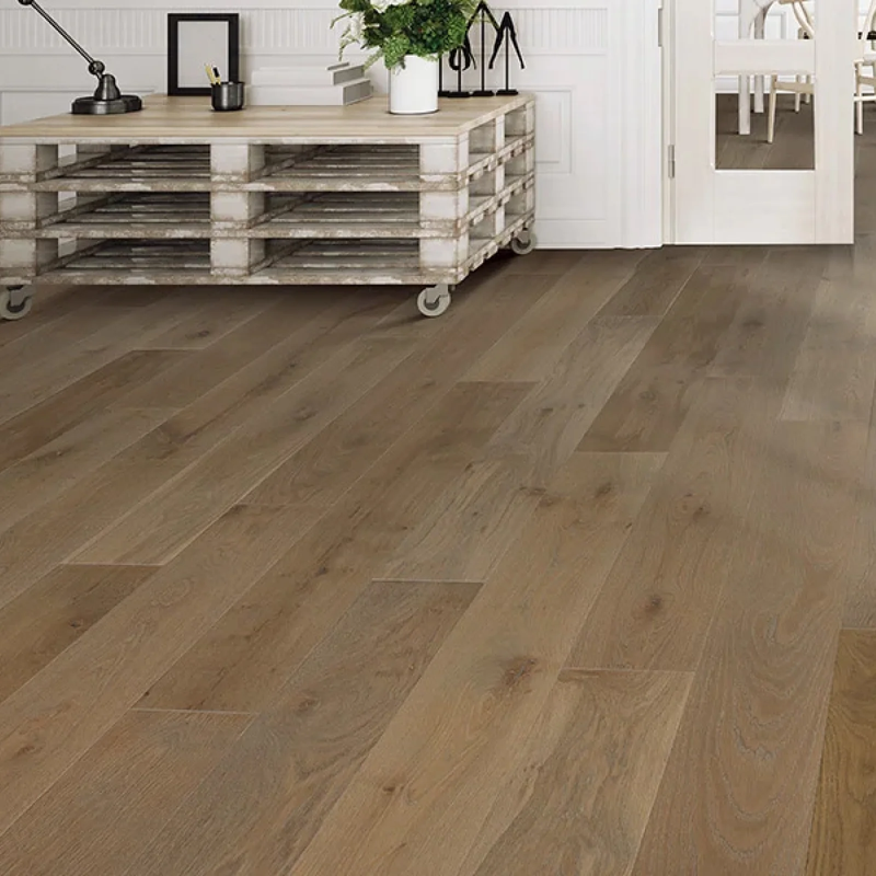 Hardwood floor installation in bright office