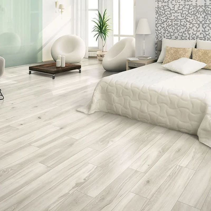Wood look ceramic tile installed in modern bedroom