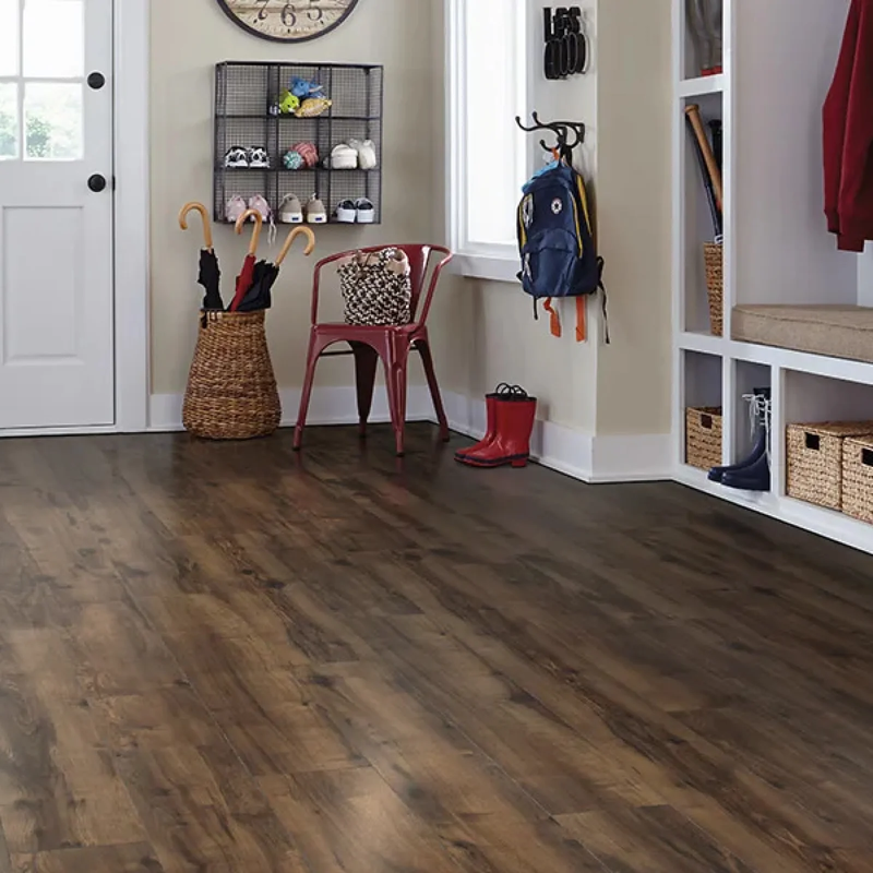 Dark laminate floors installed in mud room