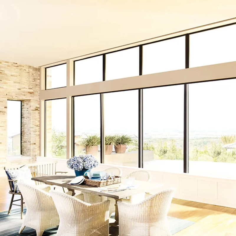 Dinning room with large windows without blinds